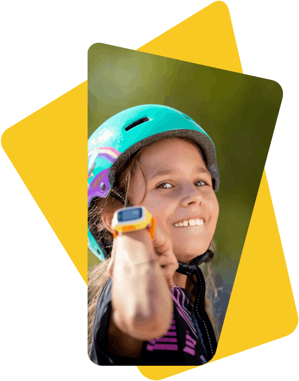 girl-wearing-skate-helmet-showing-smartwatch-and-smiling-yellow-bg
